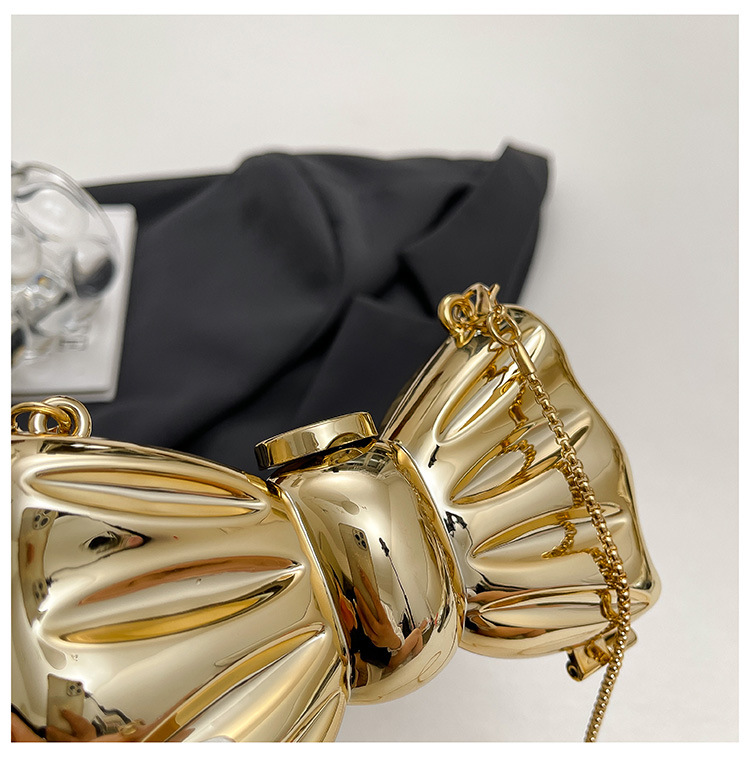 Glanzende gouden metalen strik - Luxury Bags Cute recensie en prijs